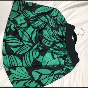 An emerald green and black skirt